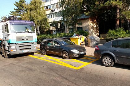 Marcaje rutiere de staționare interzisă în dreptul platformelor îngropate de depozitare a deșeurilor