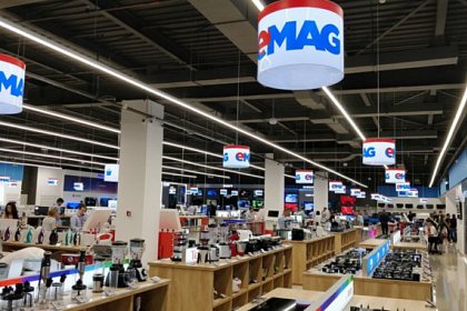 eMAG introduce taxe de livrare pentru toate comenzile